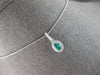 .56CT DIAMOND & AAA COLUMBIAN EMERALD 14KT WHITE GOLD OVAL HALO FLOATING PENDANT