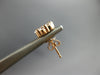 1.04CT DIAMOND 14KT ROSE GOLD 3D CLASSIC FLOWER ROUND INVISIBLE STUD EARRINGS