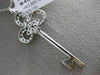 ESTATE LARGE .50CT WHITE & CHOCOLATE FANCY DIAMOND 14K WHITE GOLD 3D KEY PENDANT