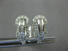 WIDE 1.36CT ROUND & PRINCESS DIAMOND 14KT WHITE GOLD LOVE KNOT HANGING EARRINGS