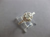 ESTATE .73CT DIAMOND 18KT WHITE GOLD 3D ROUND FLOWER ENGAGEMENT RING