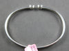 WIDE .30CT DIAMOND 18KT WHITE GOLD BAGUETTE INVISIBLE FLEXIBLE BANGLE BRACELET