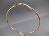 ESTATE .26CT DIAMOND 14KT YELLOW GOLD 3D DOUBLE HEART LOVE KNOT BANGLE BRACELET