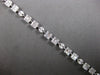 4.22CT DIAMOND 18KT WHITE GOLD ROUND BAGUETTE & MARQUISE SQUARE TENNIS BRACELET