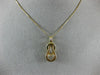 ESTATE .25CT DIAMOND 14KT YELLOW GOLD HEART LOVE KNOT INFINITY FLOATING PENDANT