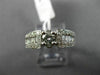 ESTATE .90CT ROUND & BAGUETTE DIAMOND 14KT WHITE GOLD FOUR PRONG ENGAGEMENT RING
