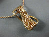 LARGE .75CT WHITE & PINK DIAMOND 18KT ROSE & BLACK GOLD CRISS CROSS WAVE PENDANT