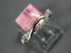 ESTATE .24CT DIAMOND 14KT WHITE GOLD 3D ROUND INFINITY 3/4TH ETERNITY LOVE RING