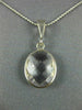 ESTATE AAA CRYSTAL 14KT WHITE GOLD 3D CLASSIC BEZEL OVAL PENDANT