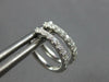 ESTATE SMALL .20CT DIAMOND 14KT WHITE GOLD 3D OVAL HUGGIE HANGING EARRINGS