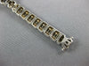 WIDE 4.80CT DIAMOND 18KT WHITE GOLD ROUND & BAGUETTE LOVE KNOT TENNIS BRACELET