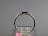 SMALL .18CT DIAMOND 18KT WHITE GOLD ROUND & BAGUETTE CLUSTER INVISIBLE FUN RING