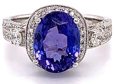 5.13CT DIAMOND & AAA TANZANITE 18KT WHITE GOLD 3D OVAL & ROUND ENGAGEMENT RING