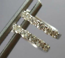 ESTATE SMALL .16CT DIAMOND 14KT WHITE GOLD 3D OVAL FUN HUGGIE HANGING EARRINGS