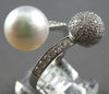 LARGE .80CT DIAMOND & AAA SOUTH SEA PEARL 18KT WHITE GOLD CRISS CROSS LOVE RING