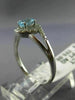 ESTATE .48CT DIAMOND & AAA OVAL CUT AQUAMARINE 14KT WHITE GOLD 3D LOVE KNOT RING