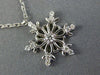 ESTATE .16CT DIAMOND 14KT WHITE GOLD 3D SNOWFLAKE FLOATING LOVE PENDANT