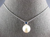.08CT AAA SAPPHIRE & SOUTH SEA PEARL 14KT WHITE GOLD BEZEL LOVE FLOATING PENDANT