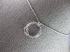 ESTATE .03CT DIAMOND 14KT WHITE GOLD SOLITAIRE LOVE KNOT CIRCLE OF LIFE NECKLACE
