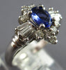 1.12CT DIAMOND & AAA TANZANITE 14K WHITE GOLD 3D OVAL & BAGUETTE ENGAGEMENT RING