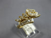 1.0CT DIAMOND 14KT YELLOW GOLD MARQUISE & BAGUETTE CRISS CROSS ANNIVERSARY RING