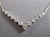 ESTATE .60CT DIAMOND 18KT WHITE GOLD 3D ROUND SHARED PRONG V SHAPE LOVE NECKLACE