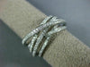 ESTATE WIDE .52CT DIAMOND 18KT WHITE GOLD MULTI ROW CRISS CROSS ANNIVERSARY RING