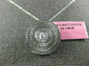 ESTATE .83CT DIAMONDS 18KT WHITE GOLD CIRCULAR MULTI ROW SWIRL SOLITAIRE PENDANT