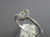 ESTATE .20CT DIAMOND 14KT WHITE GOLD ROUND & BAGUETTE OVAL FRIENDSHIP LOVE RING