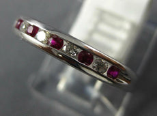 .27CT DIAMOND & AAA RUBY 18KT WHITE GOLD CLASSIC ROUND CHANNEL ANNIVERSARY RING