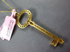 LARGE 1.01CT FANCY YELLOW DIAMOND 18KT YELLOW GOLD 3D KEY TO YOUR HEART PENDANT