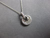 ESTATE .20CT DIAMOND 14KT WHITE GOLD ROUND & BAGUETTE CIRCULAR FLOATING PENDANT