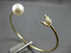 ESTATE .22CT DIAMOND & SOUTH SEA PEARL 14KT YELLOW GOLD FLEXIBLE BANGLE BRACELET