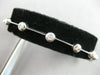 ESTATE .52CT DIAMOND 14K WHITE GOLD ROUND BEZEL BY THE YARD LOVE TENNIS BRACELET