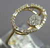 ESTATE .31CT DIAMOND 14K YELLOW GOLD 3D ROUND & BAGUETTE OPEN OVAL FUN RING