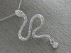 ESTATE .21CT ROUND DIAMOND 14K WHITE GOLD CLASSIC HAPPY SNAKE FLOATING PENDANT