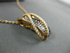 LARGE .75CT WHITE & PINK DIAMOND 18KT ROSE & BLACK GOLD CRISS CROSS WAVE PENDANT