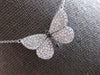 ESTATE LARGE .52CT WHITE & BLACK DIAMOND 14KT WHITE GOLD BUTTERFLY LOVE NECKLACE