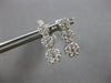 1.0CT DIAMOND 14KT WHITE GOLD 3D MULTI FLOWER JOURNEY SCREWBACK HANGING EARRINGS