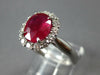 2.46CT DIAMOND & AAA RUBY 18KT WHITE GOLD 3D OVAL & ROUND FLOWER ENGAGEMENT RING