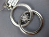 ESTATE LARGE .19CT DIAMOND 18KT WHITE GOLD FLOWER LOVE KNOT CIRCULAR FUN PENDANT