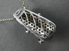 ESTATE 1.0CT WHITE & BLACK DIAMOND 14KT WHITE GOLD GRADUATING WAVE FUN PENDANT
