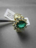 ESTATE 3.34CT DIAMOND & AAA COLOMBIAN EMERALD 14KT YELLOW GOLD FLOWER HALO RING