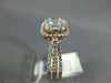 .82CT DIAMOND 14KT WHITE & ROSE GOLD 3D ROUND & BAGUETTE HALO ENGAGEMENT RING