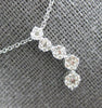 ESTATE .25CT DIAMOND 14KT WHITE GOLD MULTI FLOWER JOURNEY FUN FLOATING PENDANT