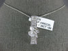 ESTATE 1.36CT DIAMOND 18KT WHITE GOLD PRINCESS ROUND & BAGUETTE BAR BOW PENDANT