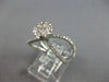 ESTATE LARGE .64CT DIAMOND 14KT WHITE GOLD FLOWER CRISS CROSS INFINITY LOVE RING