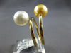 LARGE AAA WHITE & GOLDEN SOUTH SEA PEARL 18KT YELLOW GOLD CRISS CROSS LOVE RING