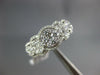ESTATE 1.07CT DIAMOND 18KT WHITE GOLD MULTI FLOWER HALO CLASSIC ANNIVERSARY RING