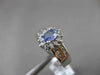 ESTATE 1.08CT DIAMOND & AAA TANZANITE 14KT WHITE GOLD CLUSTER ENGAGEMENT RING
